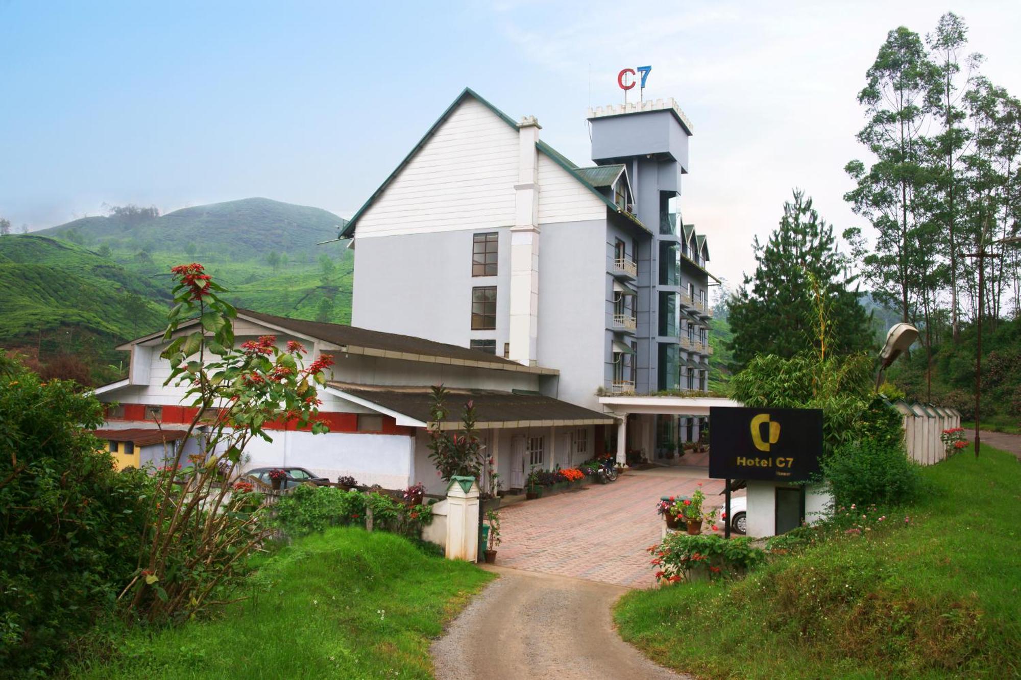 Hotel C7 Мунар Екстериор снимка